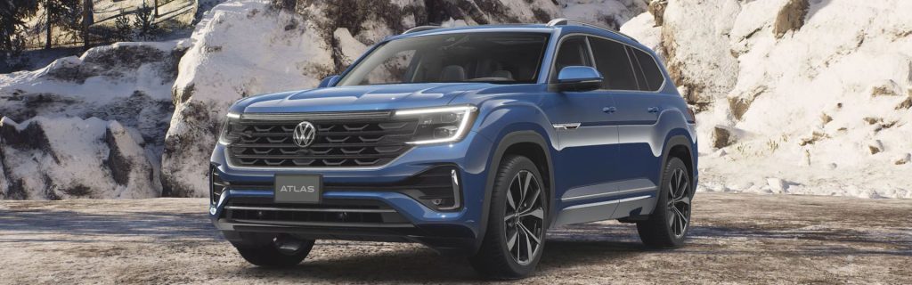 2026 Volkswagen Blue Atlas parked in snowy mountains.